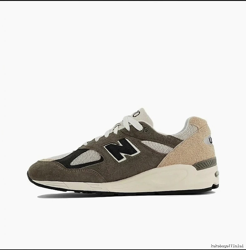 The New Balance 990 series retro-style gray-brown shoes.